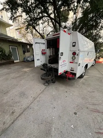Magnet Plumbing service vehicle on-site for Grease Trap Cleaning in Country Club Hills